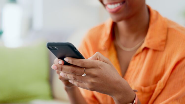 Closeup, hands and black woman with smartphone, typing and connection for social media, contact or .